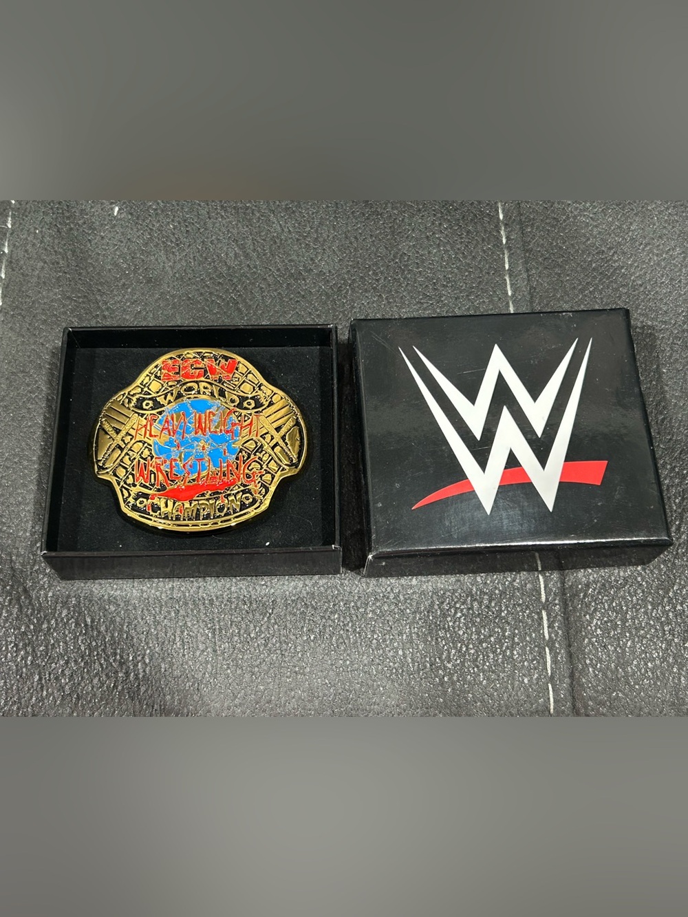 WWE ECW world championship belt buckle! WWEshop exclusive! NEW